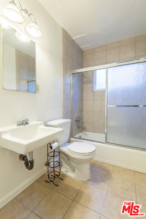 826 Hyperion Avenue Los Angeles, CA 90029 - Photo 10 of 25 a bathroom with a sink toilet and shower