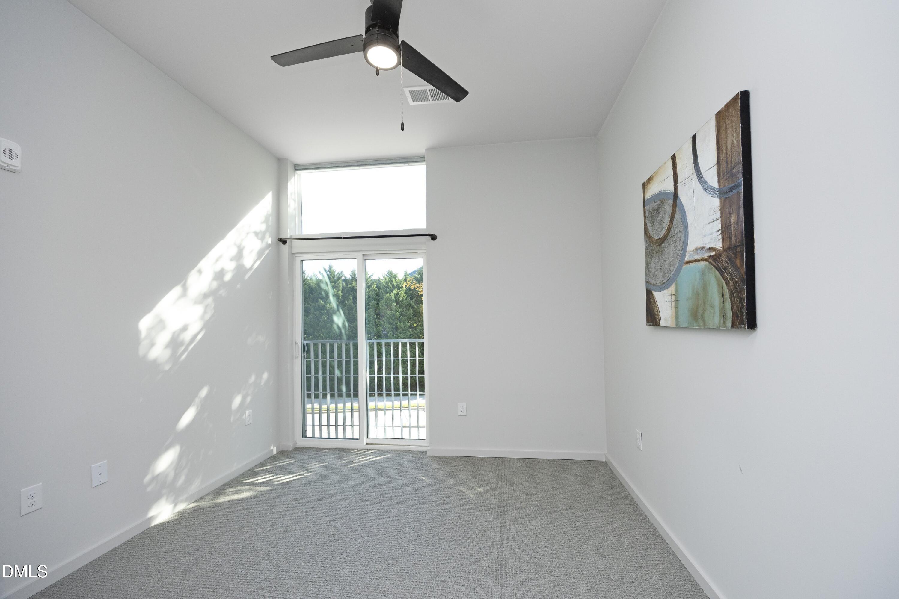 600 South Duke Street, Unit 26 Durham, NC 27701 - Photo 14 of 35 an empty room with windows and entrance