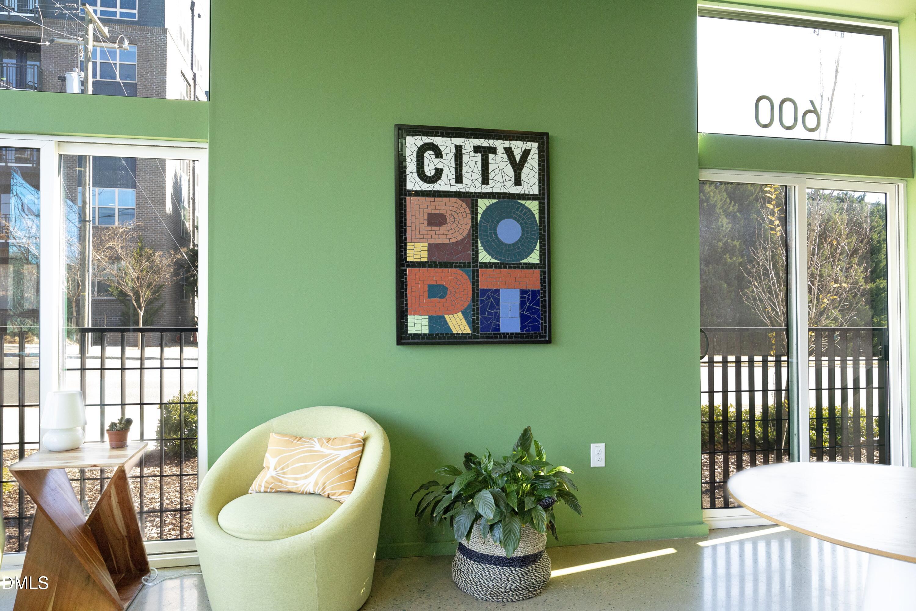 600 South Duke Street, Unit 26 Durham, NC 27701 - Photo 4 of 35 a living room with furniture and a potted plant