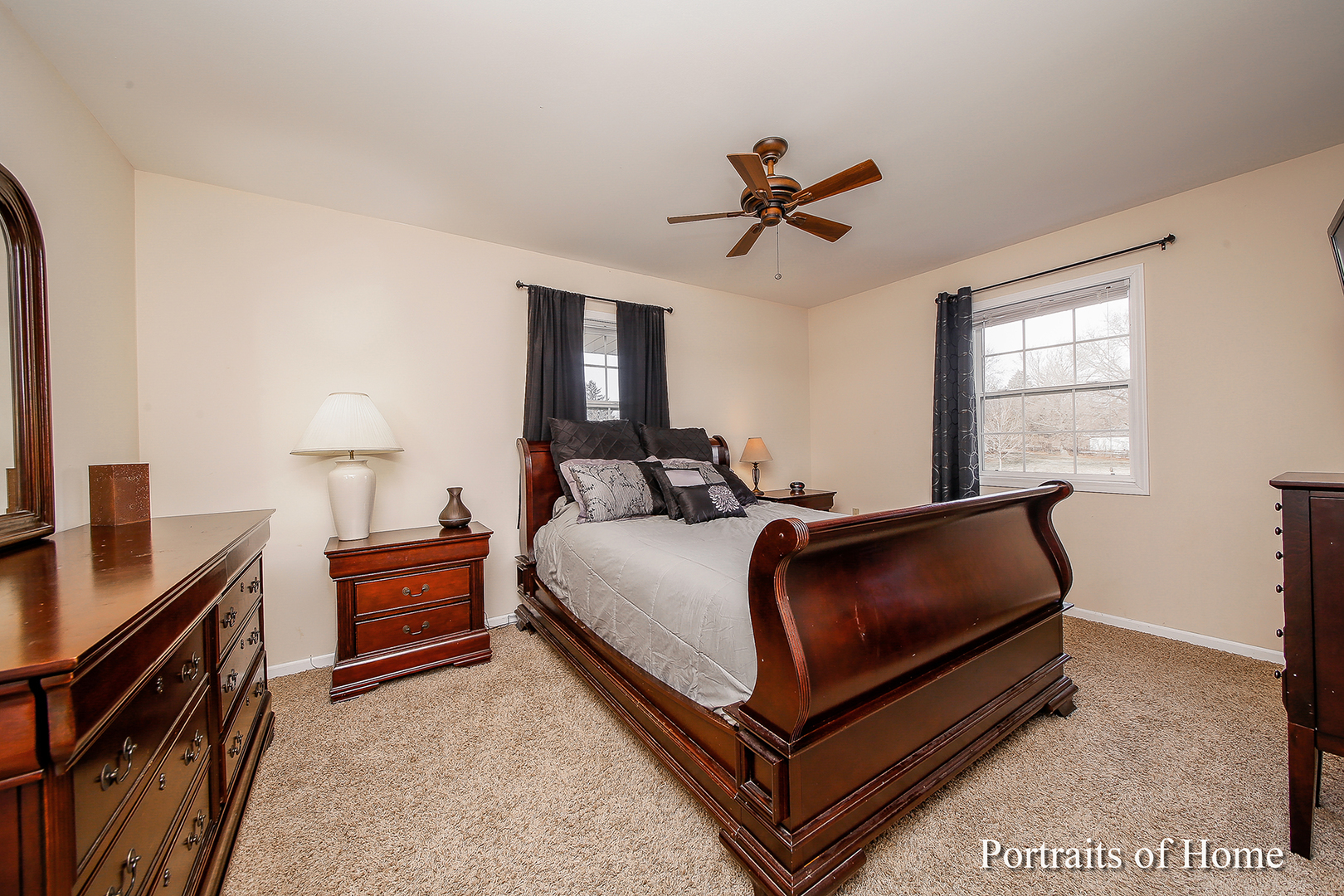 29W150 Smith Road West Chicago, IL 60185 - Photo 14 of 25 a bed room with a bed and a night stand