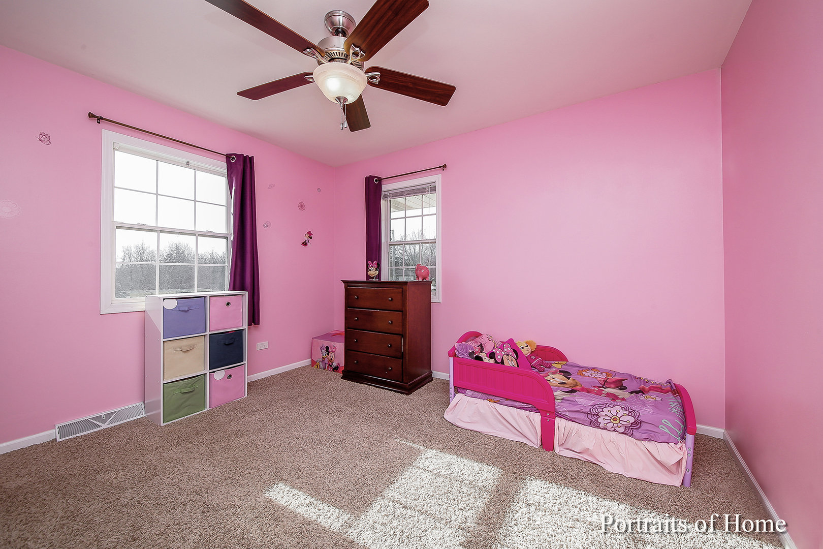 29W150 Smith Road West Chicago, IL 60185 - Photo 17 of 25 a bedroom with a bed and a chandelier