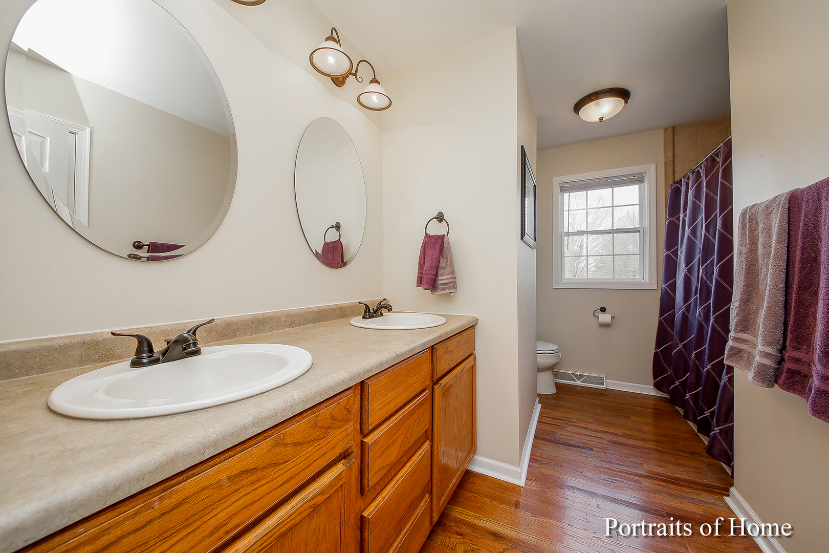 29W150 Smith Road West Chicago, IL 60185 - Photo 18 of 25 a bathroom with a granite countertop sink and a mirror