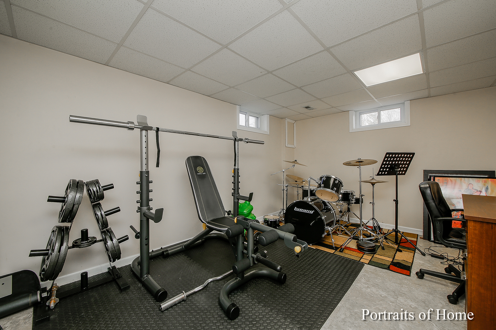 29W150 Smith Road West Chicago, IL 60185 - Photo 19 of 25 a view of a room with gym equipment