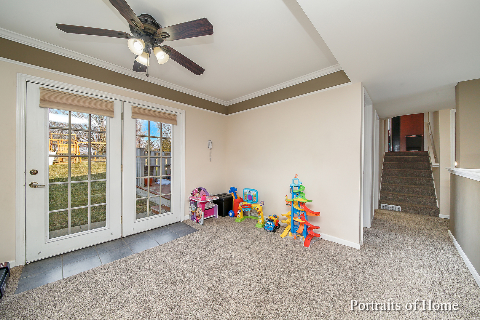 29W150 Smith Road West Chicago, IL 60185 - Photo 4 of 25 a view of a room with toys and a chandelier