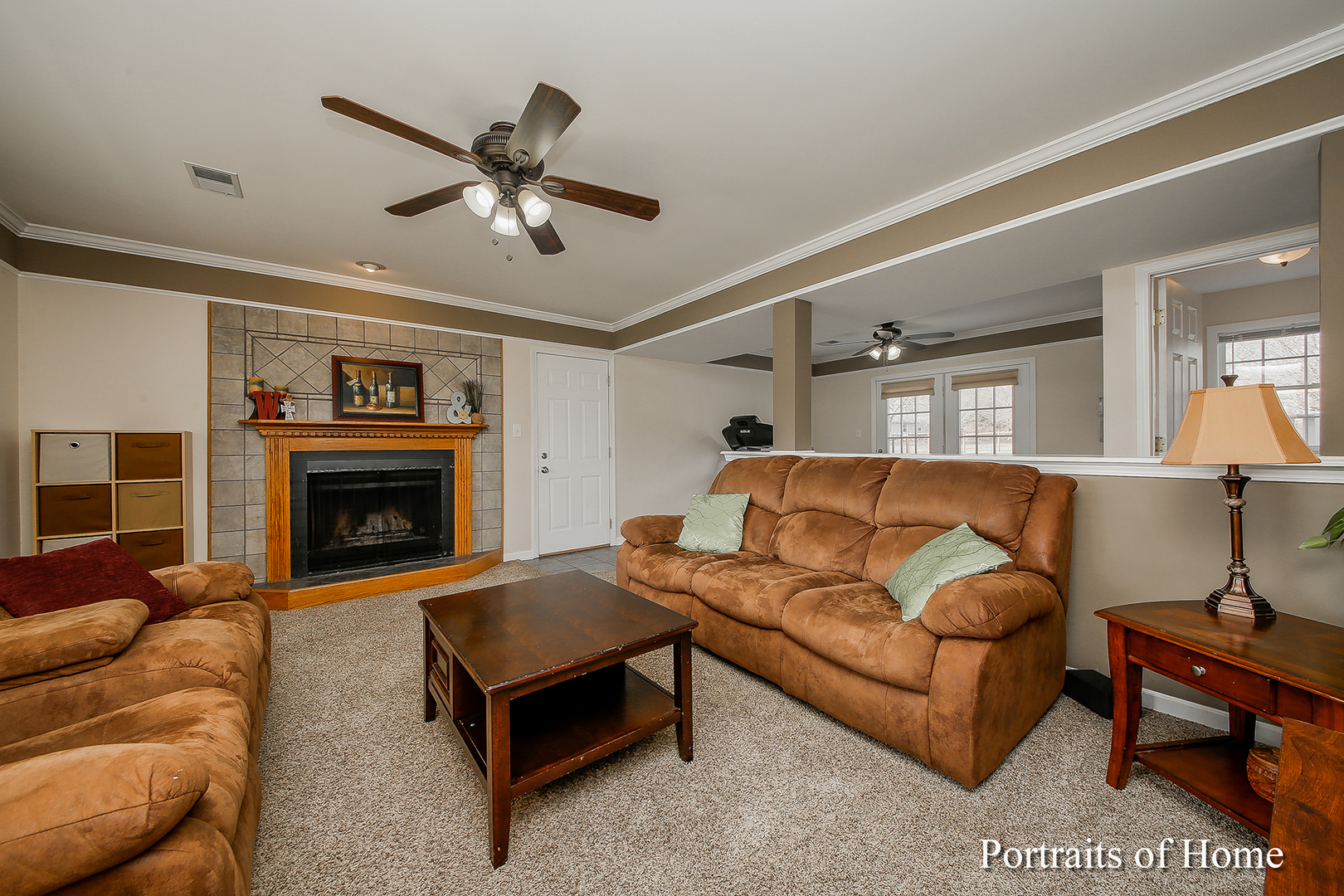 29W150 Smith Road West Chicago, IL 60185 - Photo 5 of 25 a living room with furniture and a fireplace