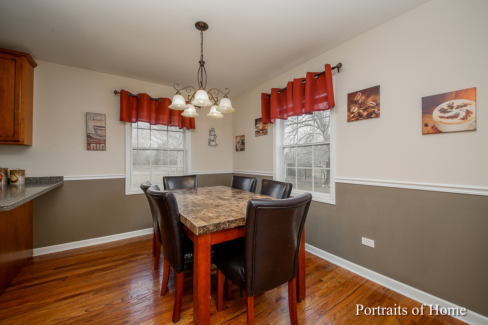 29W150 Smith Road West Chicago, IL 60185 - Photo 8 of 25 a view of a dining room with furniture window and wooden floor