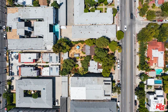 an aerial view of multiple house with outdoor space