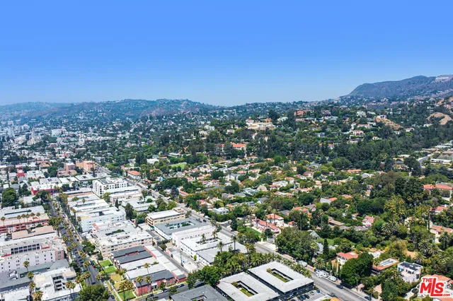 an aerial view of residential house with outdoor space