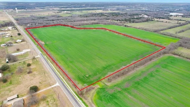 a view of swimming pool with a yard
