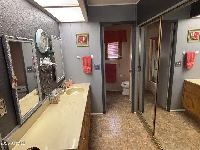 a very nice looking room with a large mirror