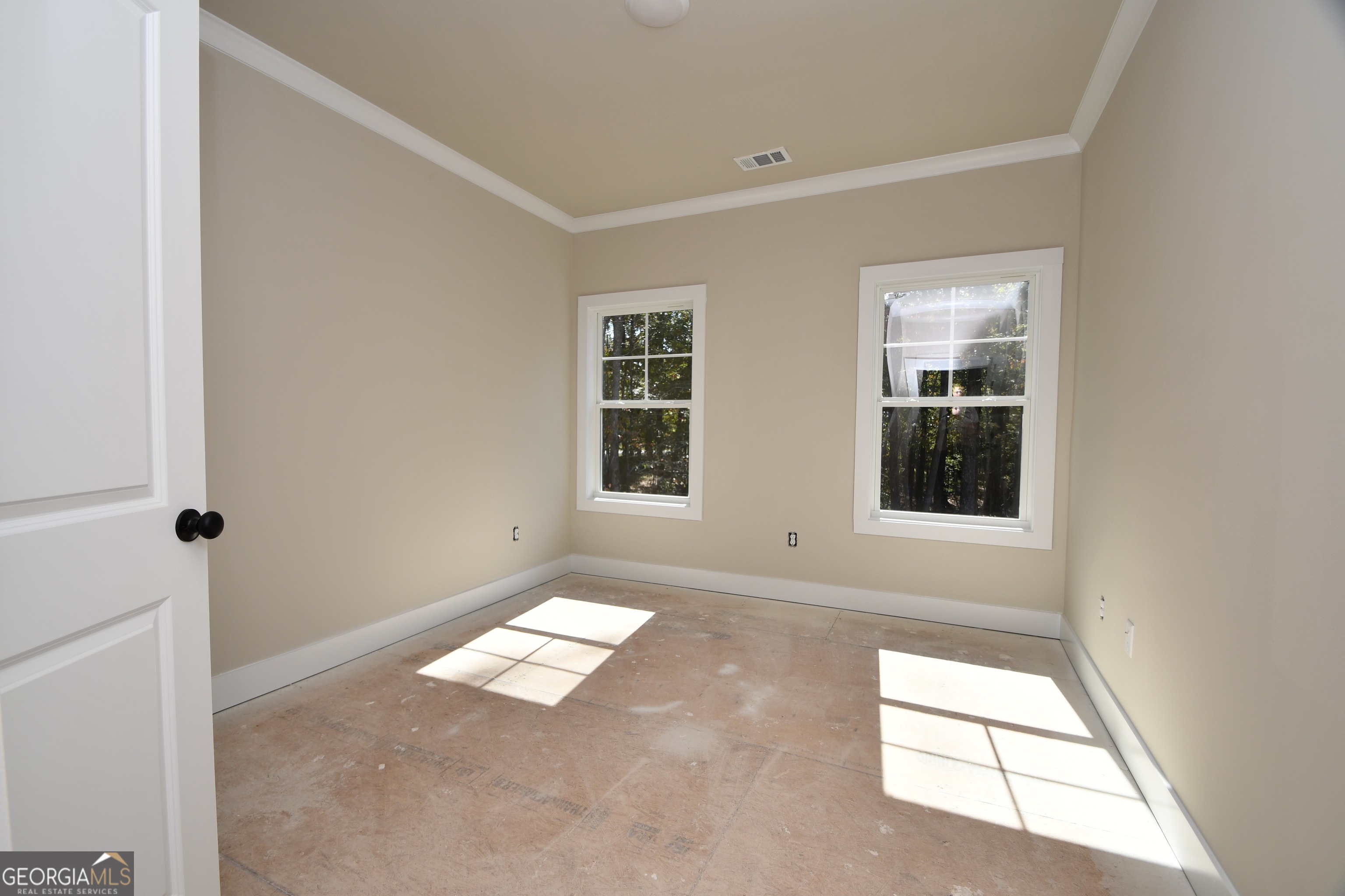 1021 Pointe Street South Tignall, GA 30668 - Photo 11 of 24 an empty room with windows