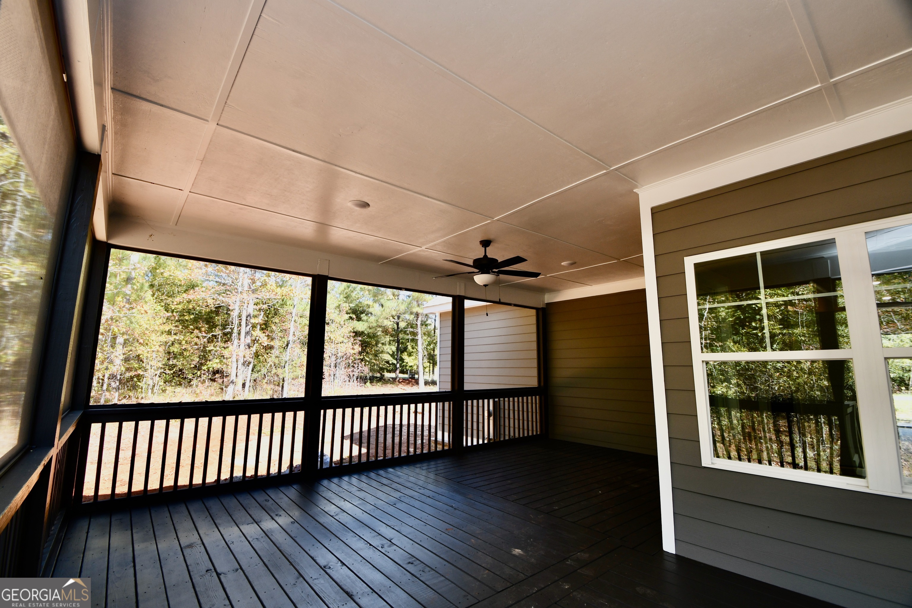 1021 Pointe Street South Tignall, GA 30668 - Photo 22 of 24 a view of a porch with wooden floor and outdoor space