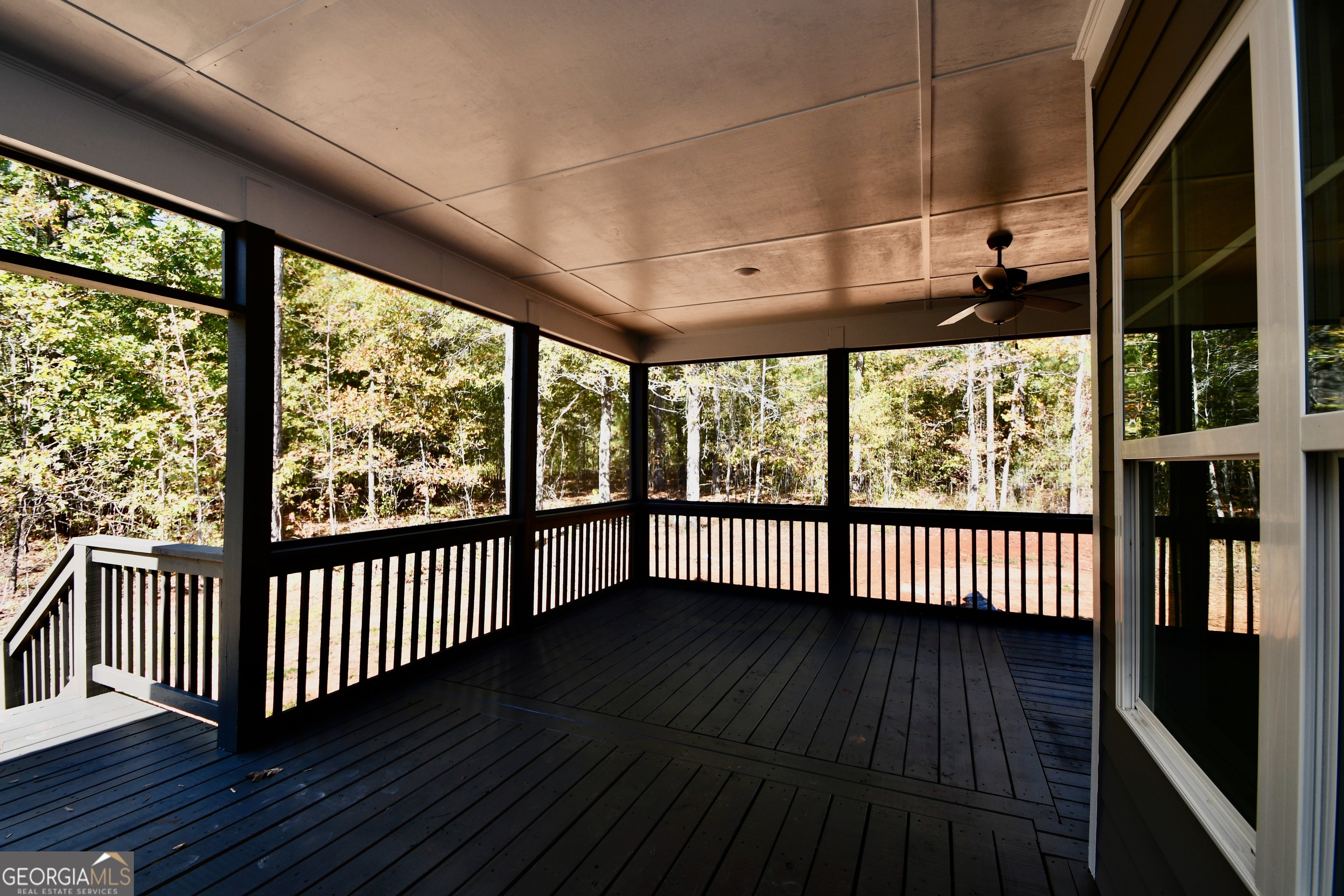 1021 Pointe Street South Tignall, GA 30668 - Photo 23 of 24 a view of a porch with wooden floor