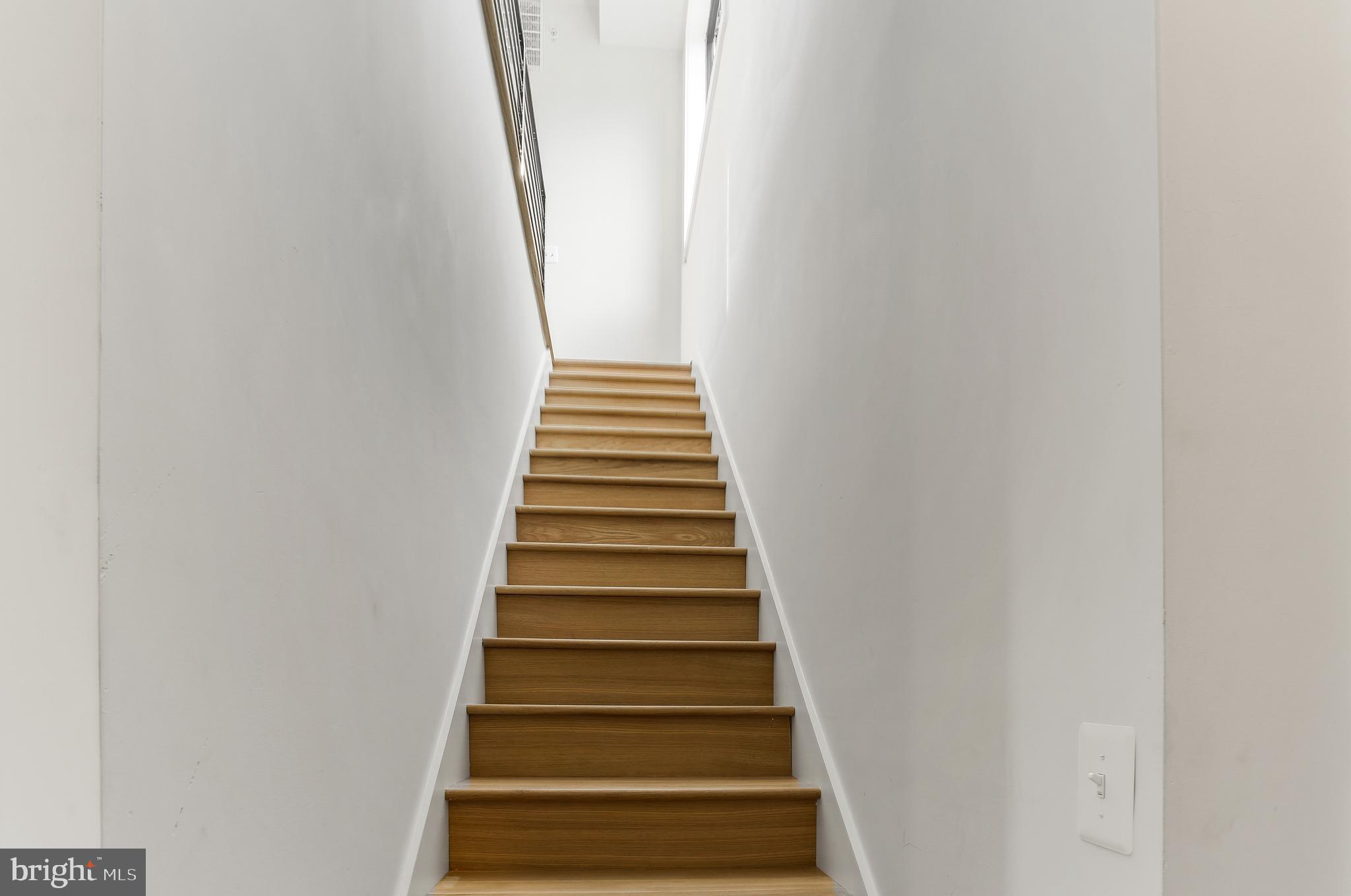 2248 Ontario Road Northwest, Unit PH8 Washington, DC 20009 - Photo 27 of 48 Staircase to Den/Media Room and Master Suite