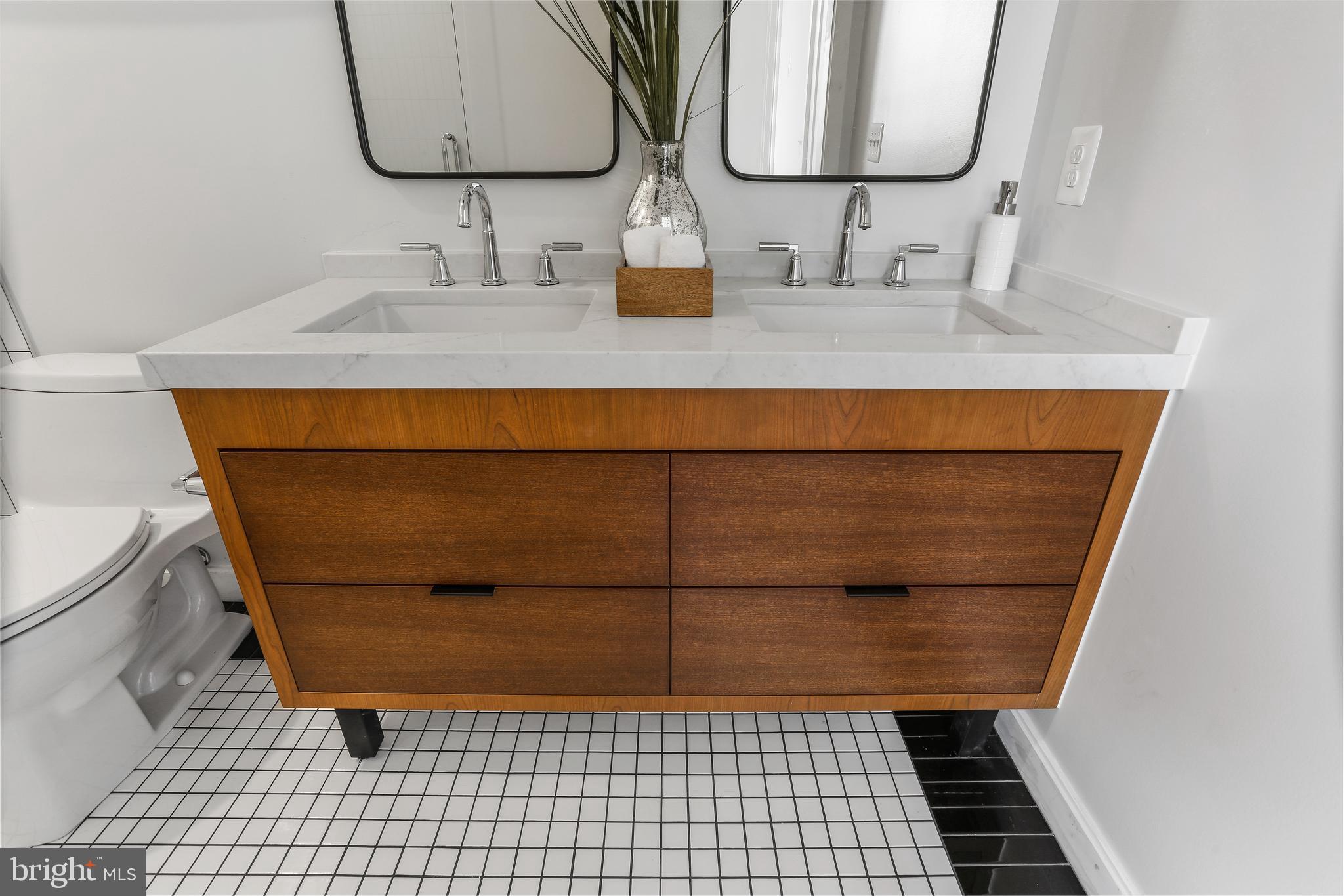 2248 Ontario Road Northwest, Unit PH8 Washington, DC 20009 - Photo 40 of 48 Custom Tile work, Designer Black Framed Mirrors