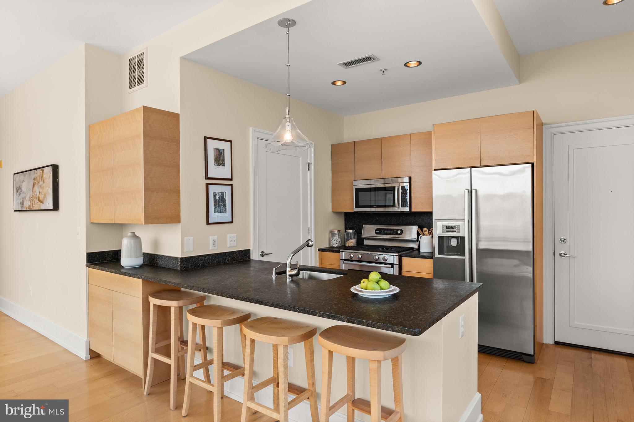 2516 Q Street Northwest, Unit C301 Washington, DC 20007 - Photo 3 of 17 Generous counter space and storage throughout