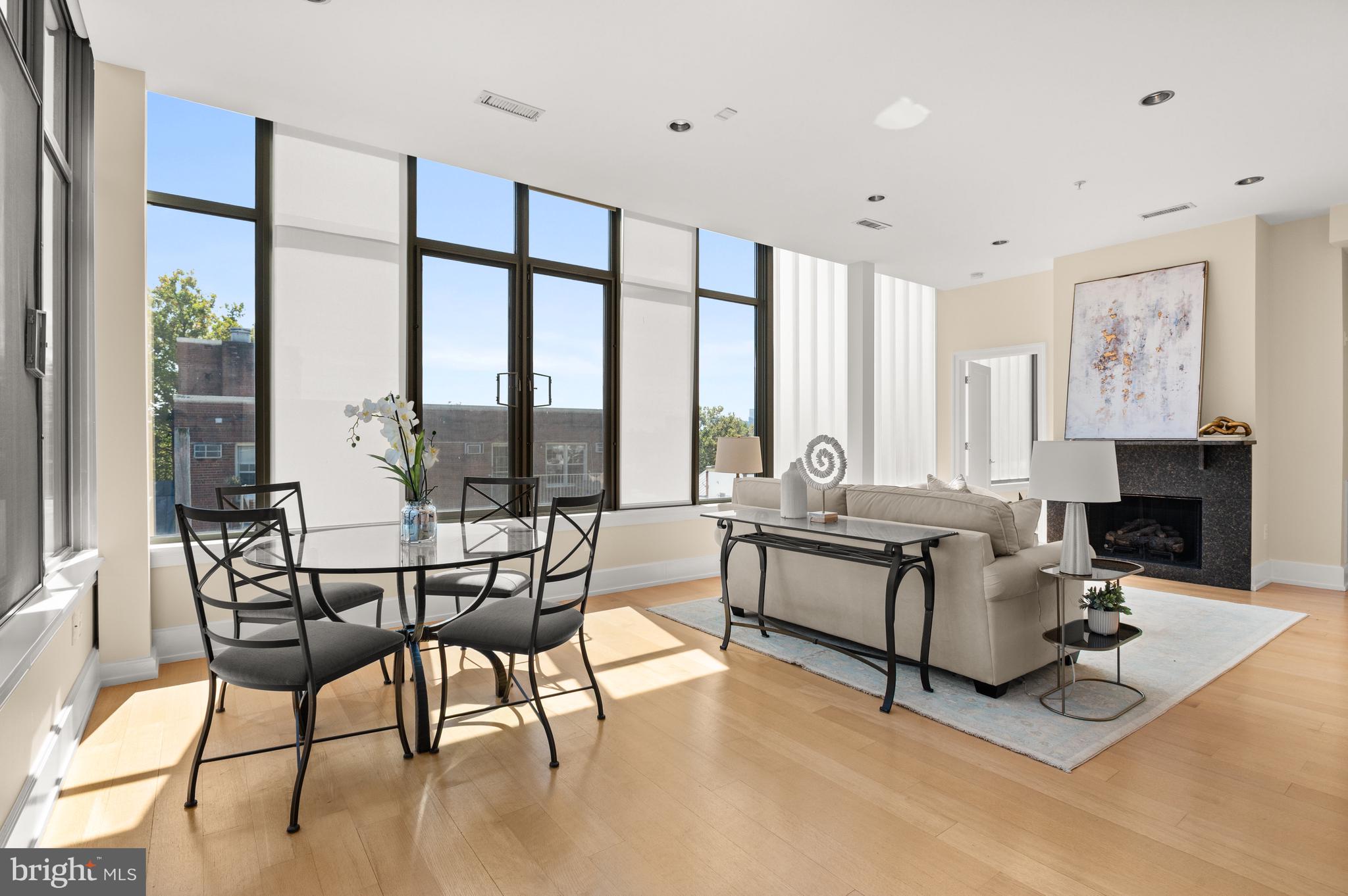 2516 Q Street Northwest, Unit C301 Washington, DC 20007 - Photo 4 of 17 Dining/living room w/ fireplace