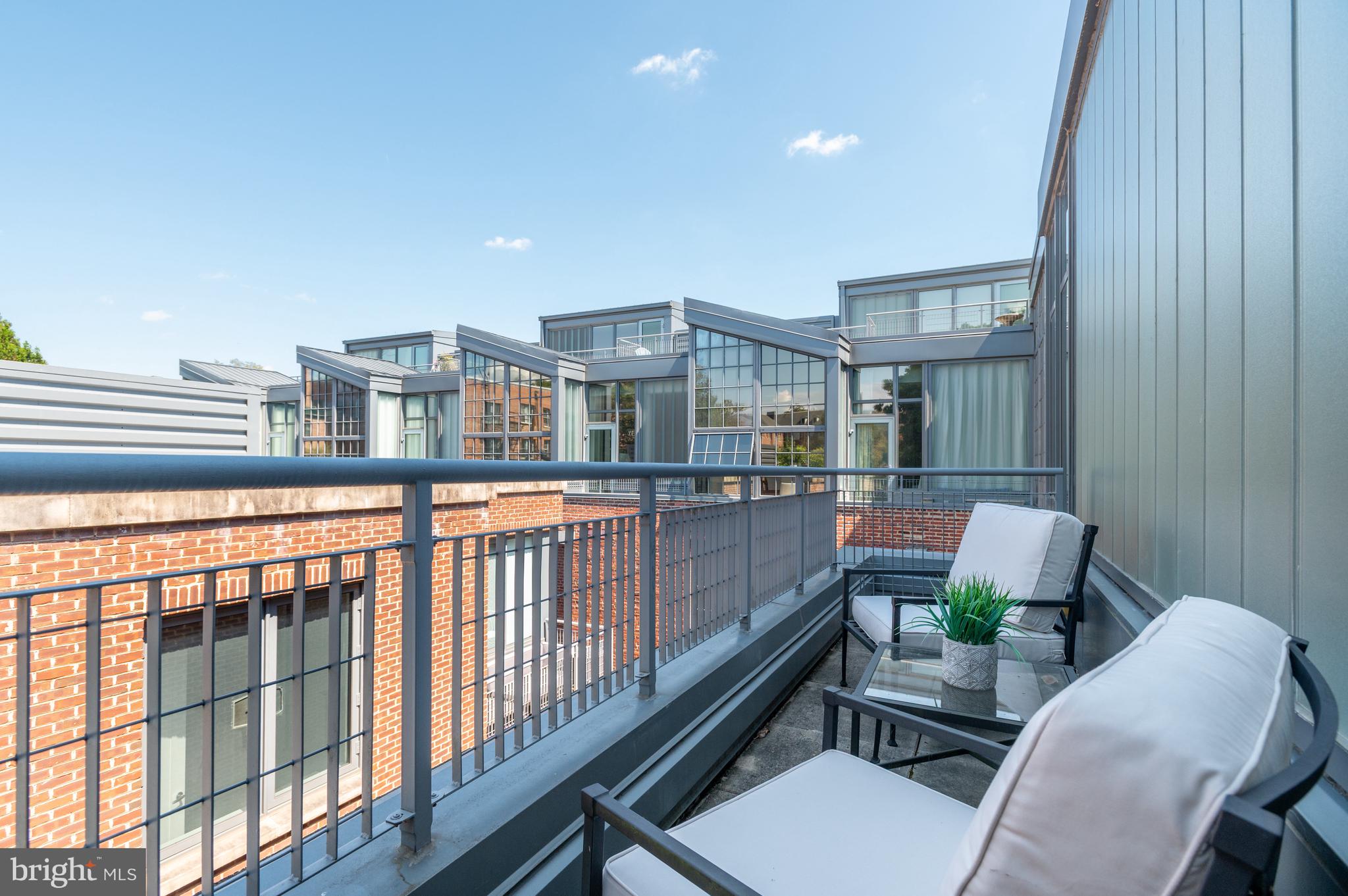 2516 Q Street Northwest, Unit C301 Washington, DC 20007 - Photo 10 of 17 Primary bedroom balcony
