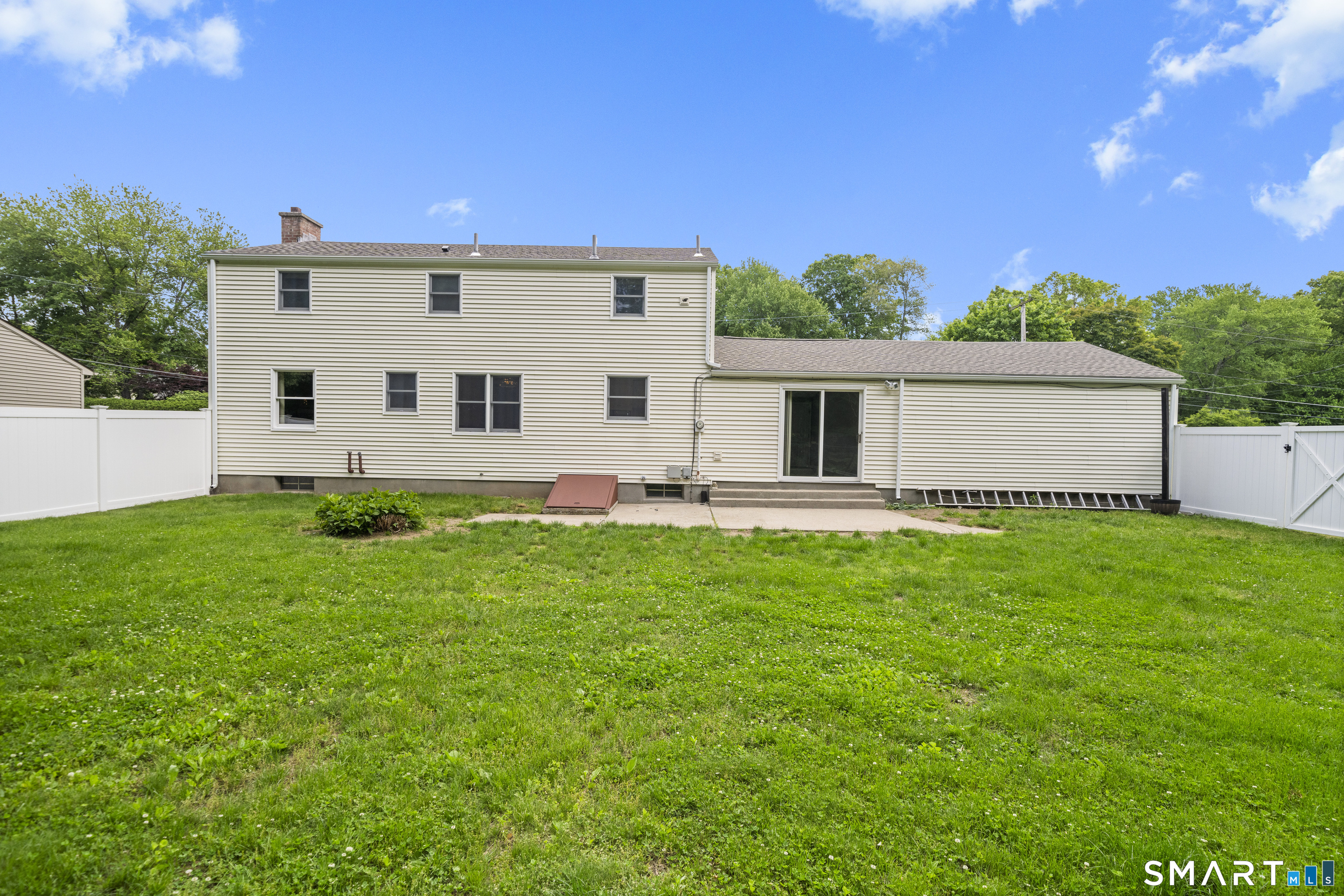 6 Cartier Road Enfield, CT 06082 - Photo 36 of 40 a view of a house with backyard