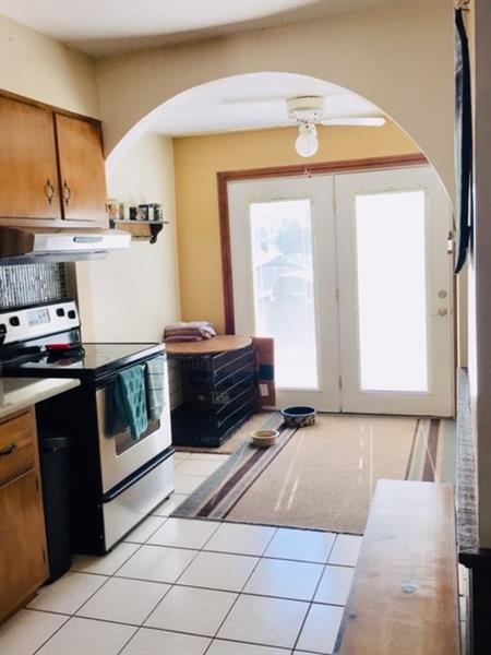 114 Maple Avenue Butler, PA 16001 - Photo 6 of 25 Sunny and cheerful is how you describe this kitchen with access to the patio.