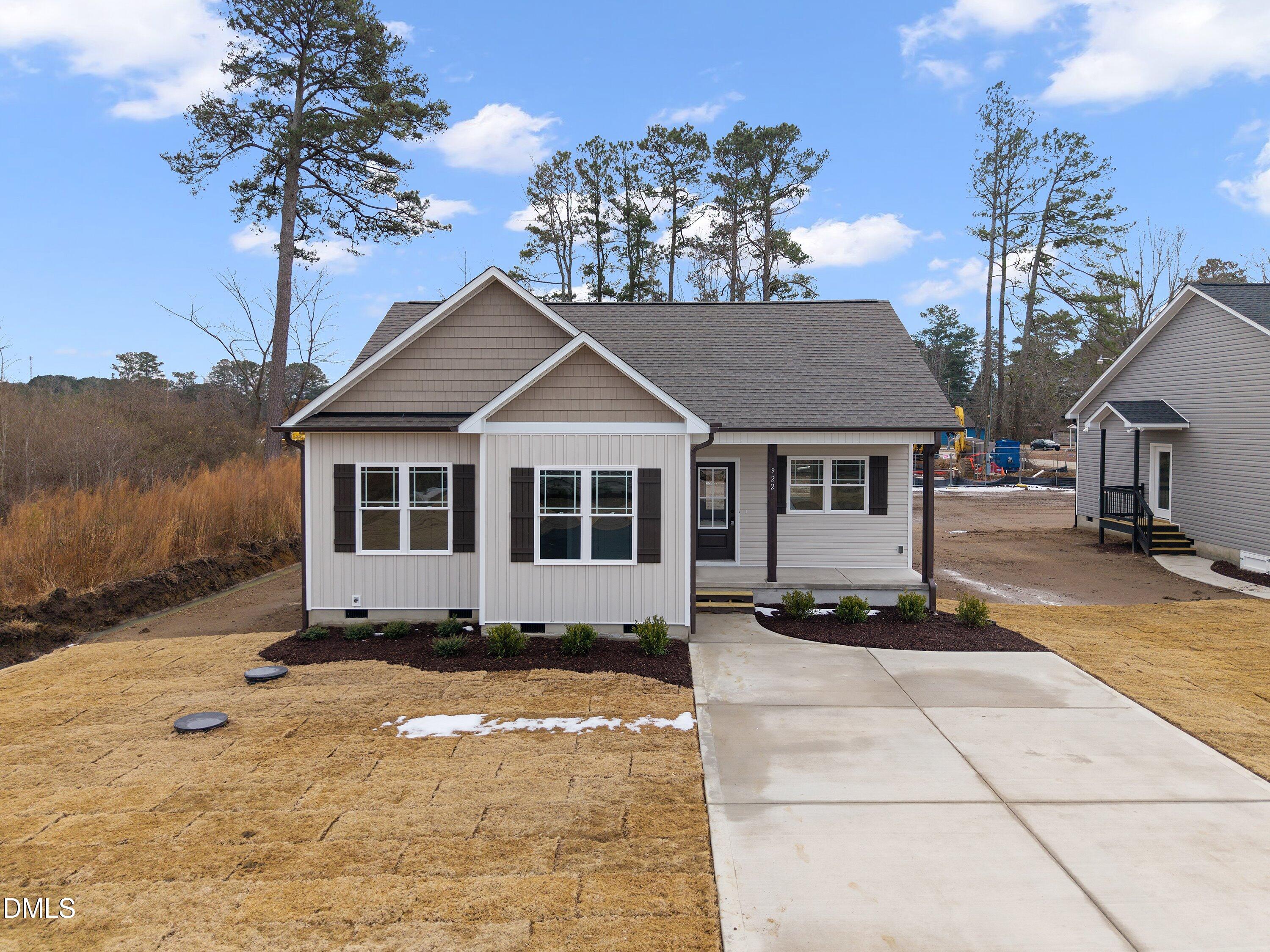922 Micro Road West Selma, NC 27576 - Photo 1 of 36 a front view of a house with a yard