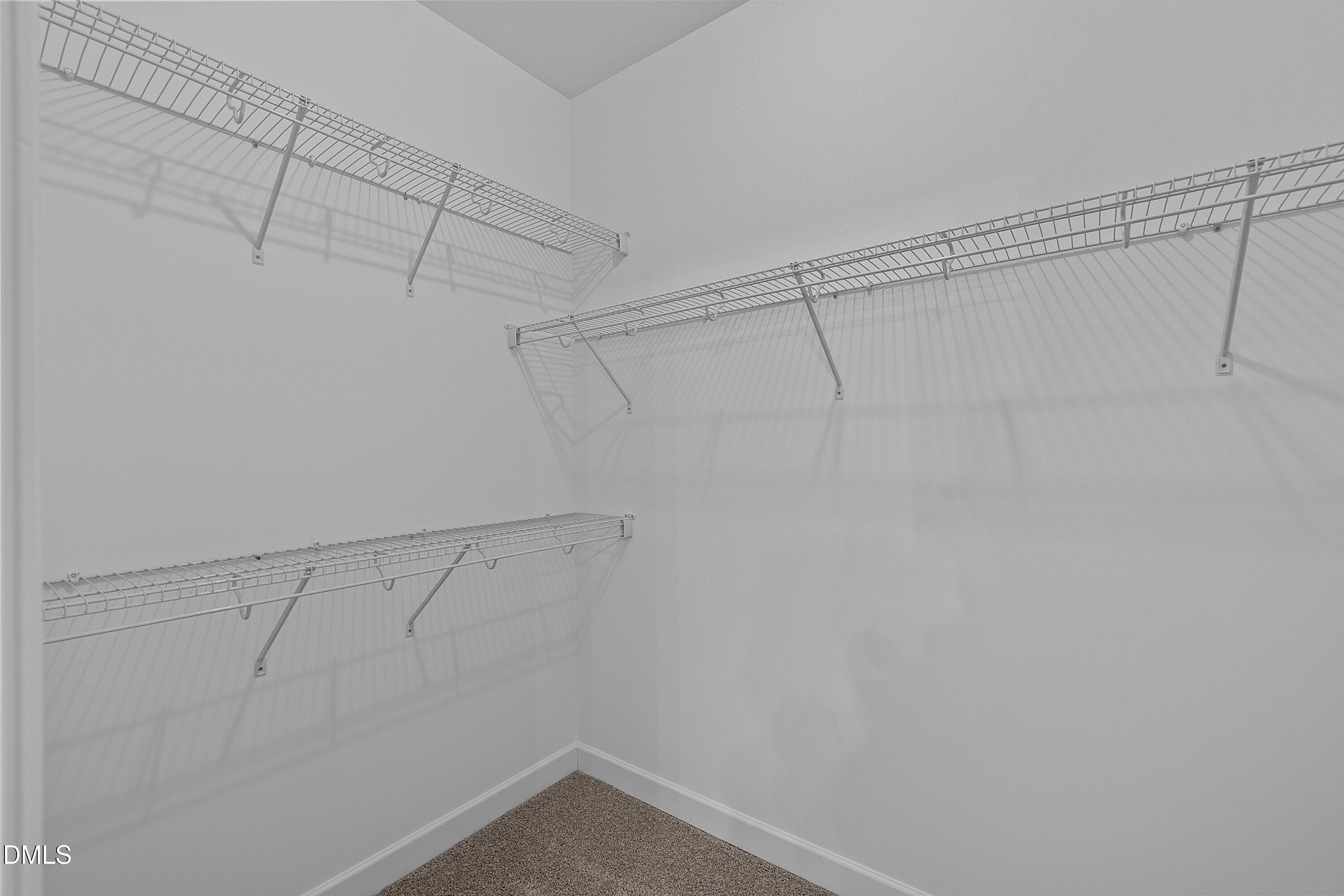 922 Micro Road West Selma, NC 27576 - Photo 27 of 36 a view of a room with racks on the wall