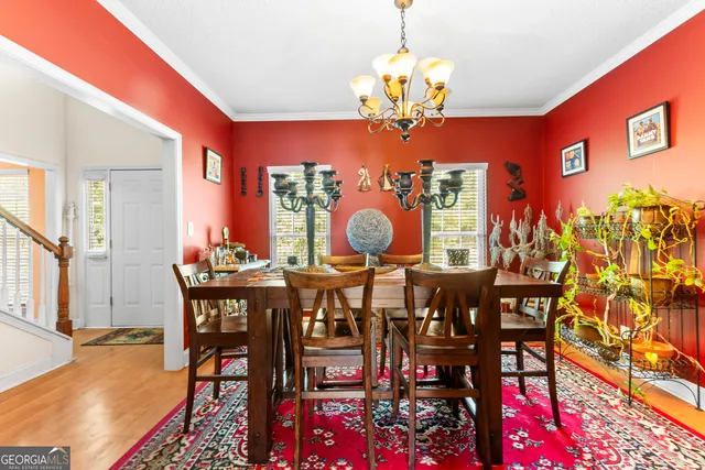 a view of a dining room with furniture