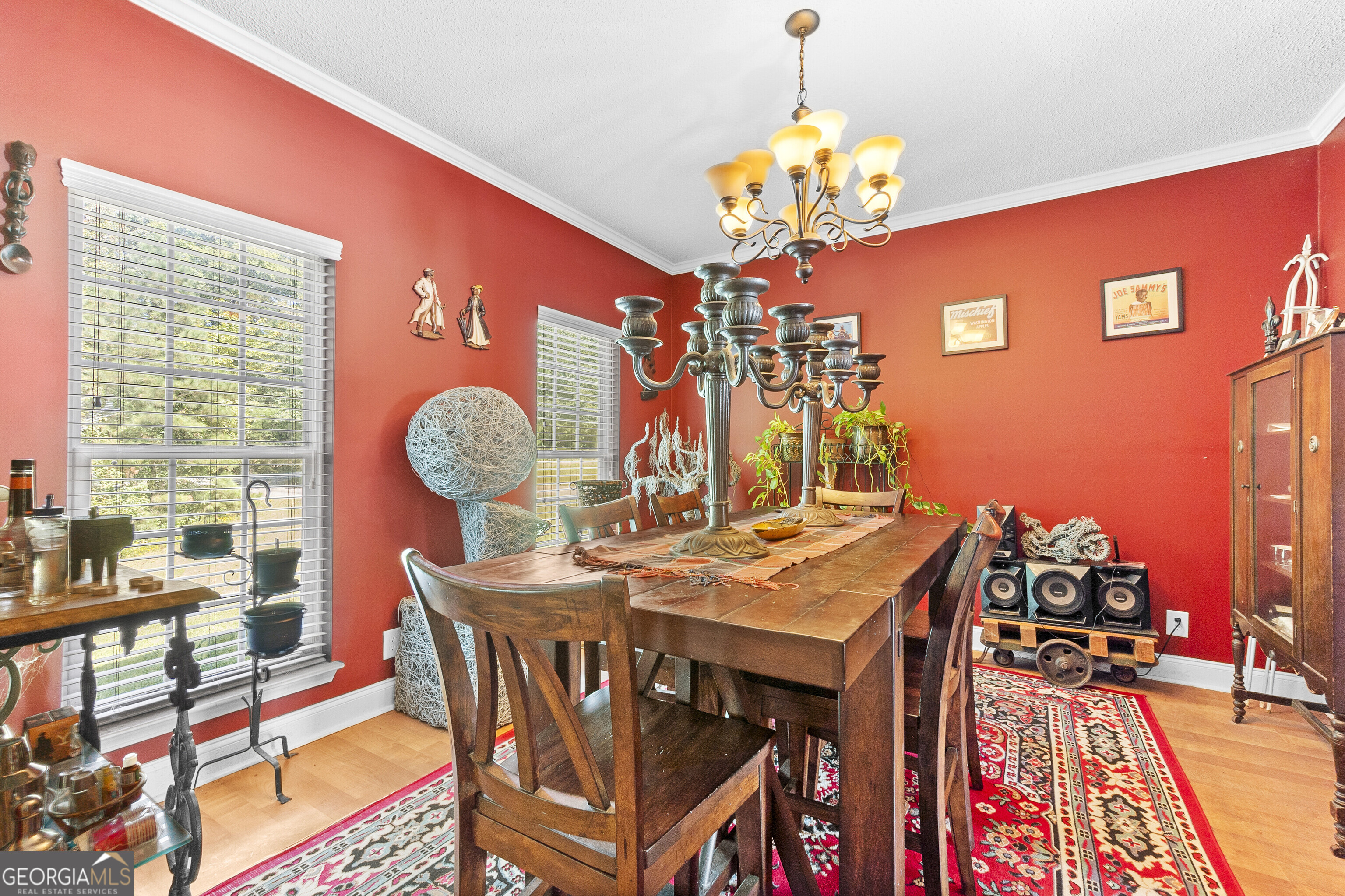 3608 Joycliff Road Macon, GA 31211 - Photo 15 of 44 a view of a dining room with furniture and chandelier