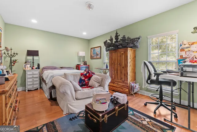 a bed room with a bed and a couch