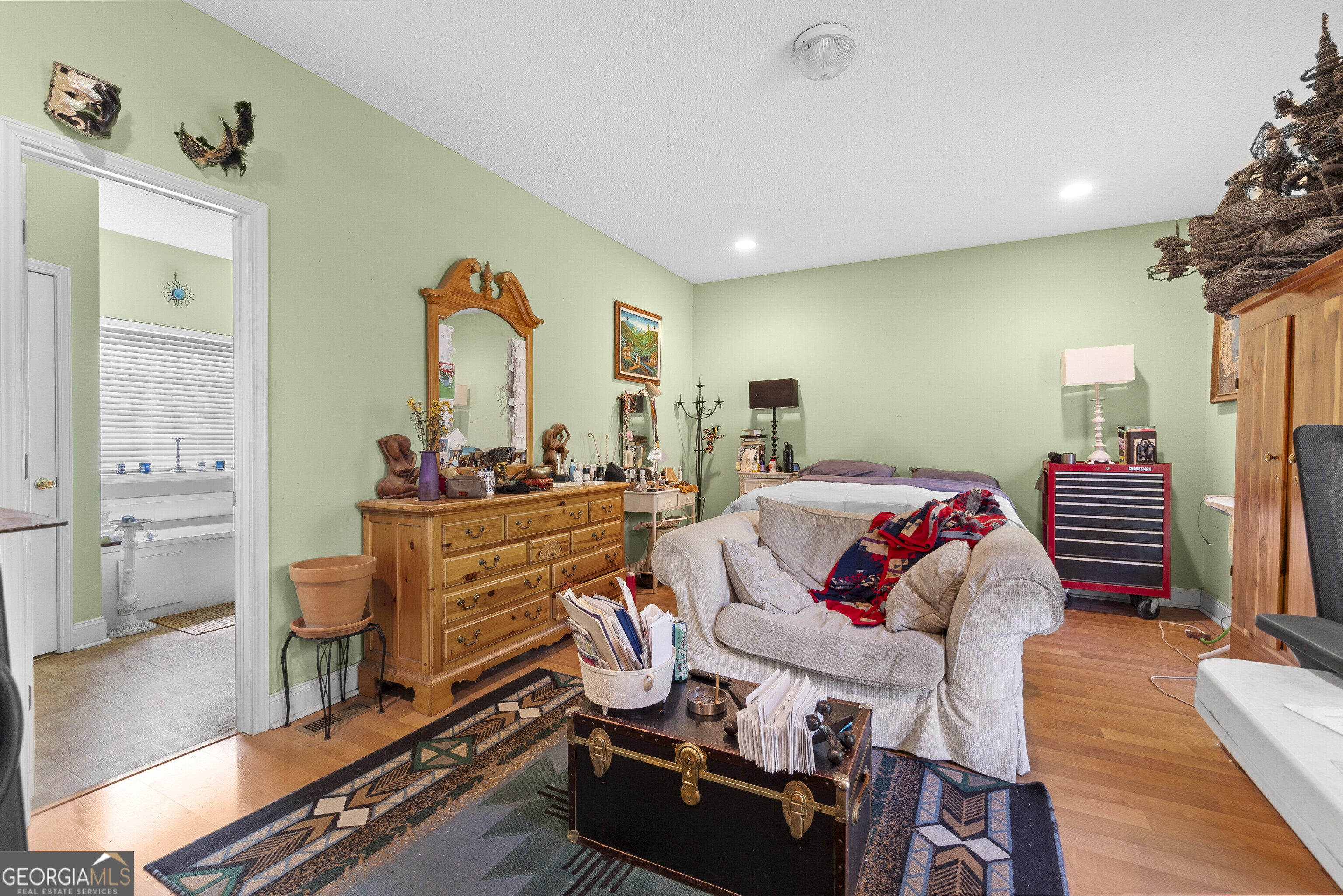 3608 Joycliff Road Macon, GA 31211 - Photo 19 of 44 a living room with furniture and wooden floor