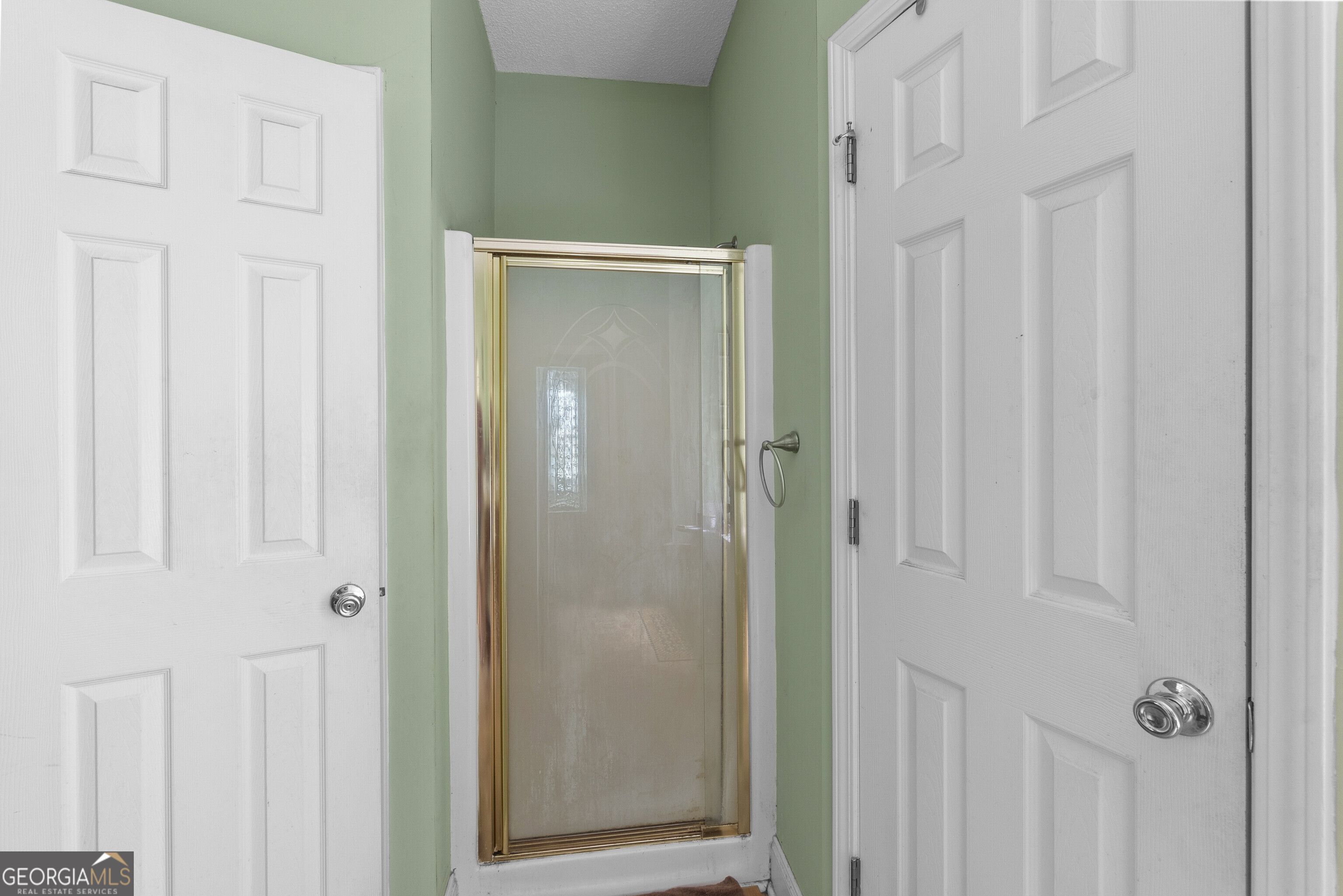 3608 Joycliff Road Macon, GA 31211 - Photo 22 of 44 a bathroom with a shower