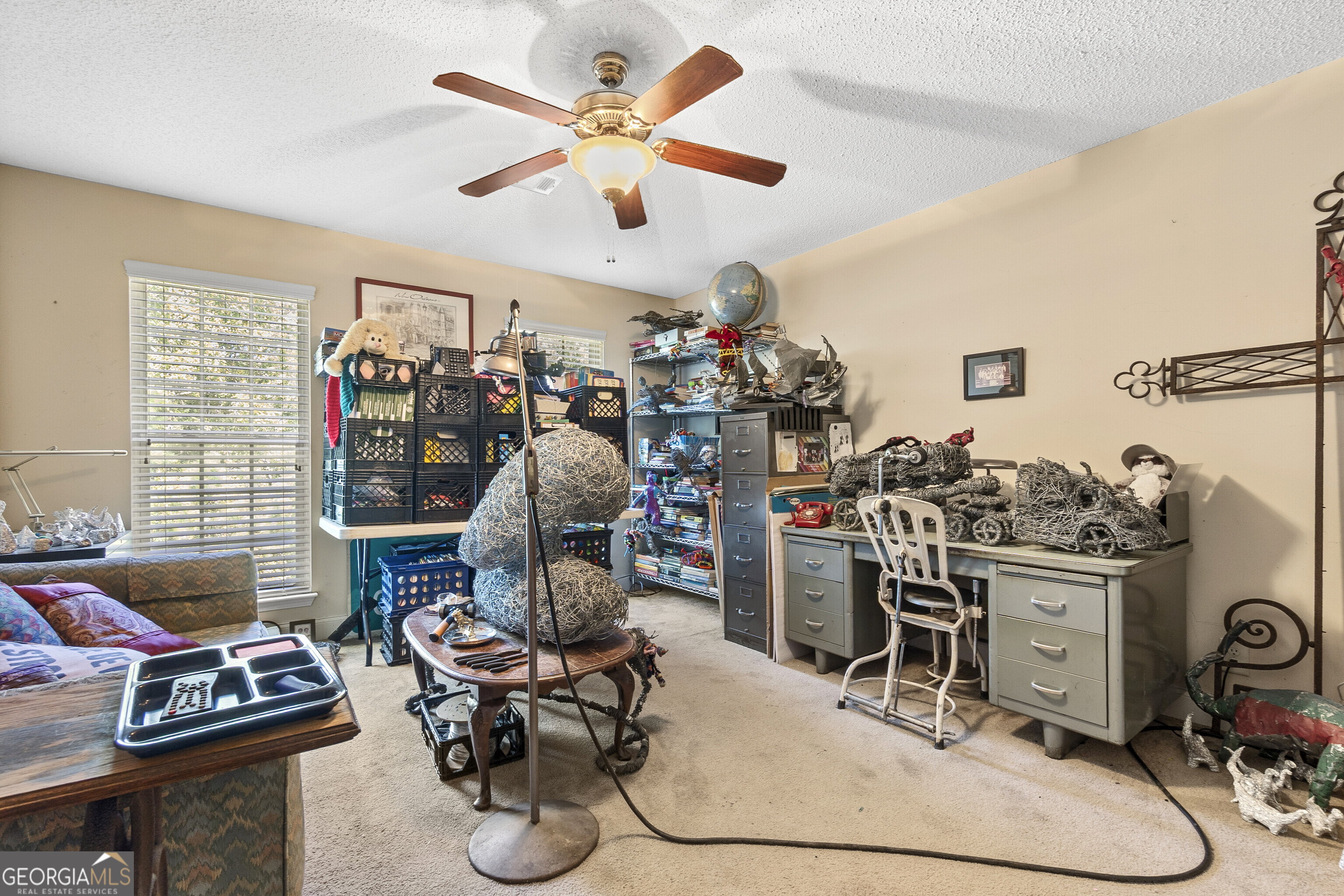3608 Joycliff Road Macon, GA 31211 - Photo 24 of 44 a view of a workspace with furniture and toys