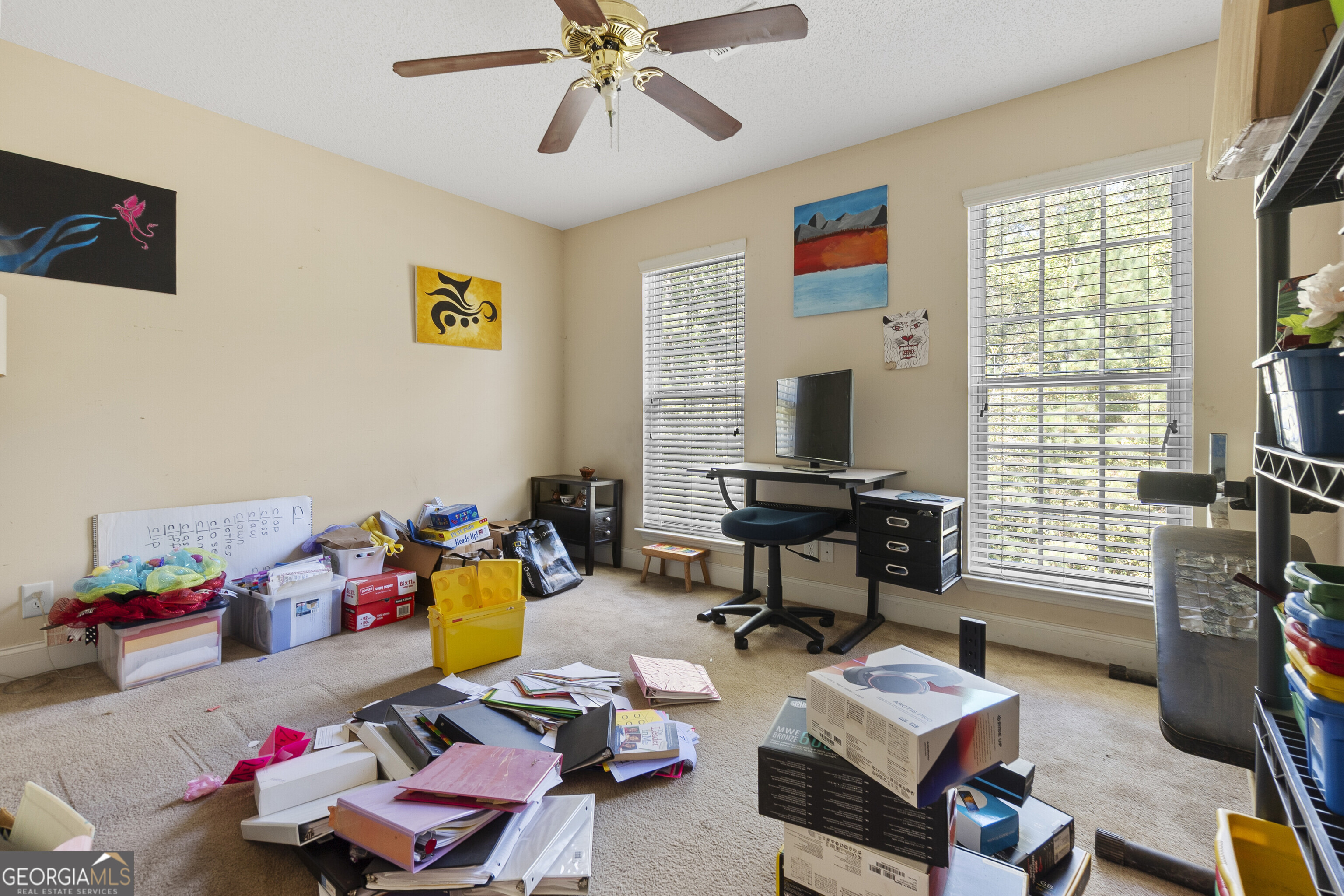 3608 Joycliff Road Macon, GA 31211 - Photo 27 of 44 a living room with furniture and a flat screen tv