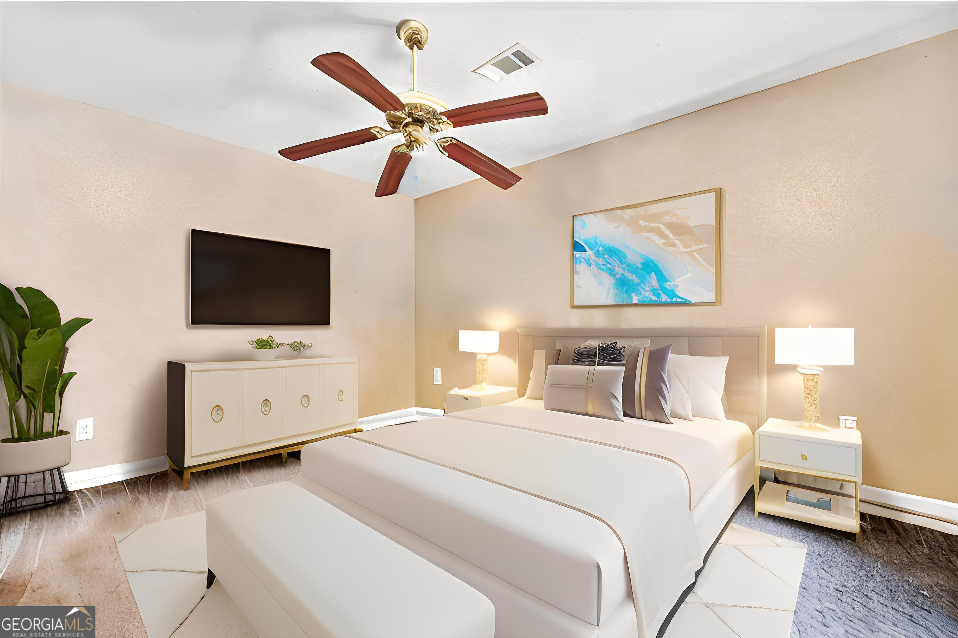 3608 Joycliff Road Macon, GA 31211 - Photo 31 of 44 a bedroom with a large bed and a flat screen tv