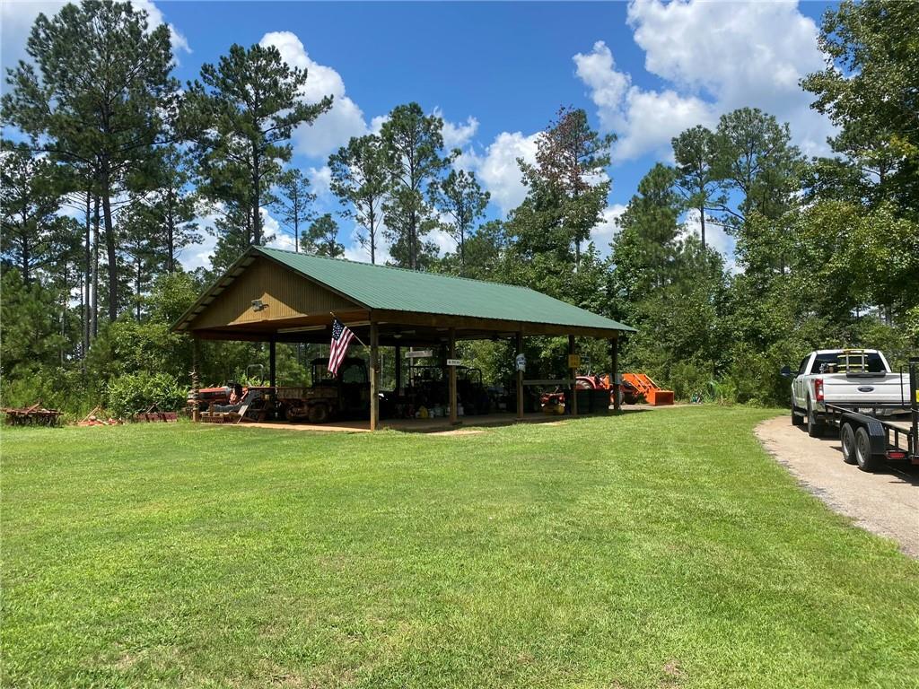 2470 Fears Road Madison, GA 30650 - Photo 29 of 48 a view of a house with a yard
