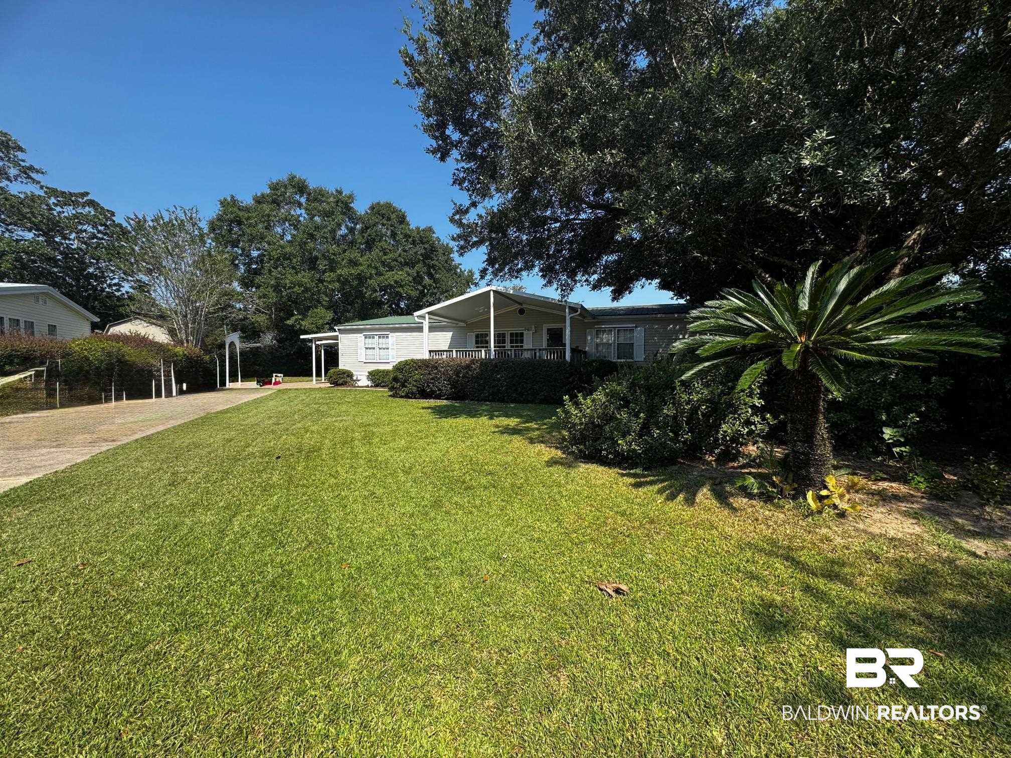 1882 Cisco Circle Lillian, AL 36549 - Photo 1 of 40 View of front of home with a front yard