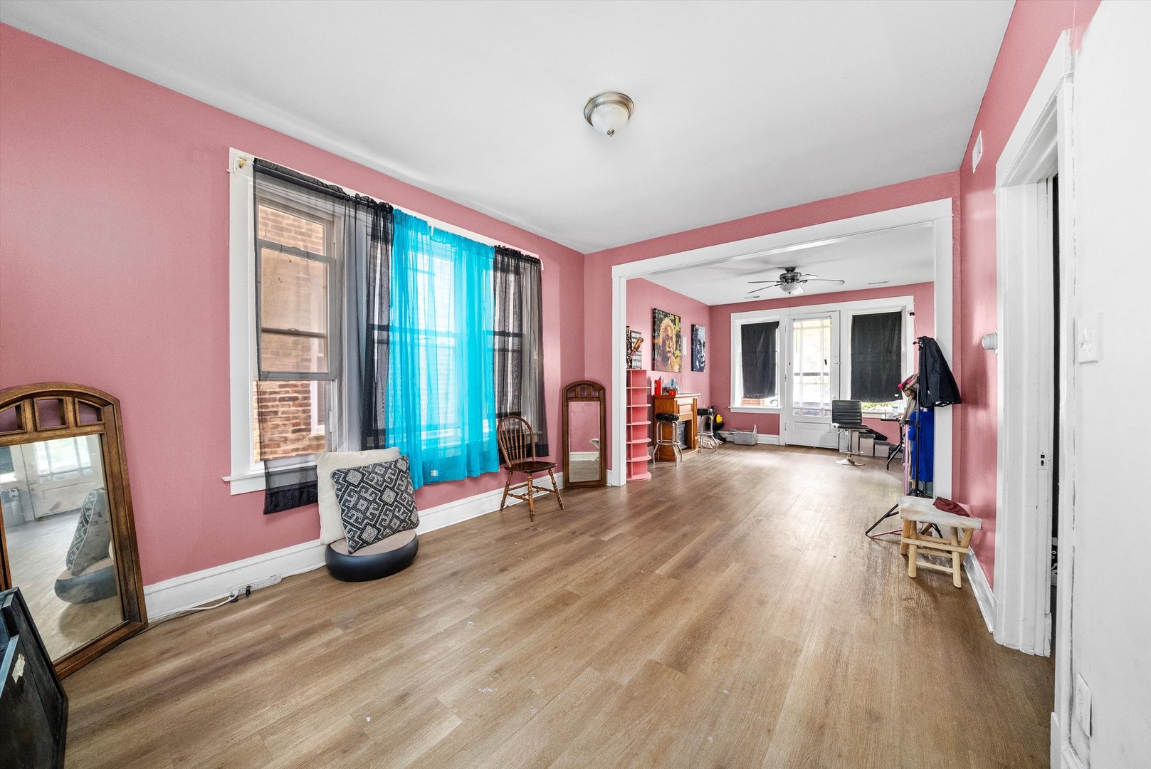 4318 West Cermak Road Chicago, IL 60623 - Photo 11 of 17 a view of a livingroom with furniture and a large window