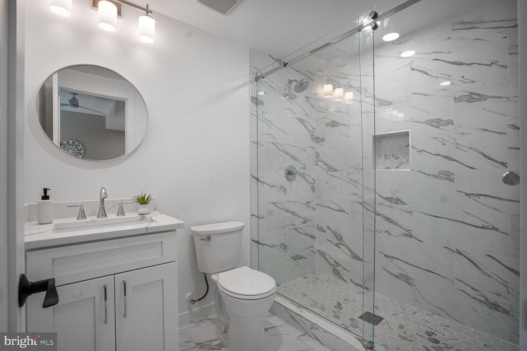 504 Kingsley Road Southwest Vienna, VA 22180 - Photo 96 of 148 Bathroom #3 Features Porcelain Tile and Vanity!