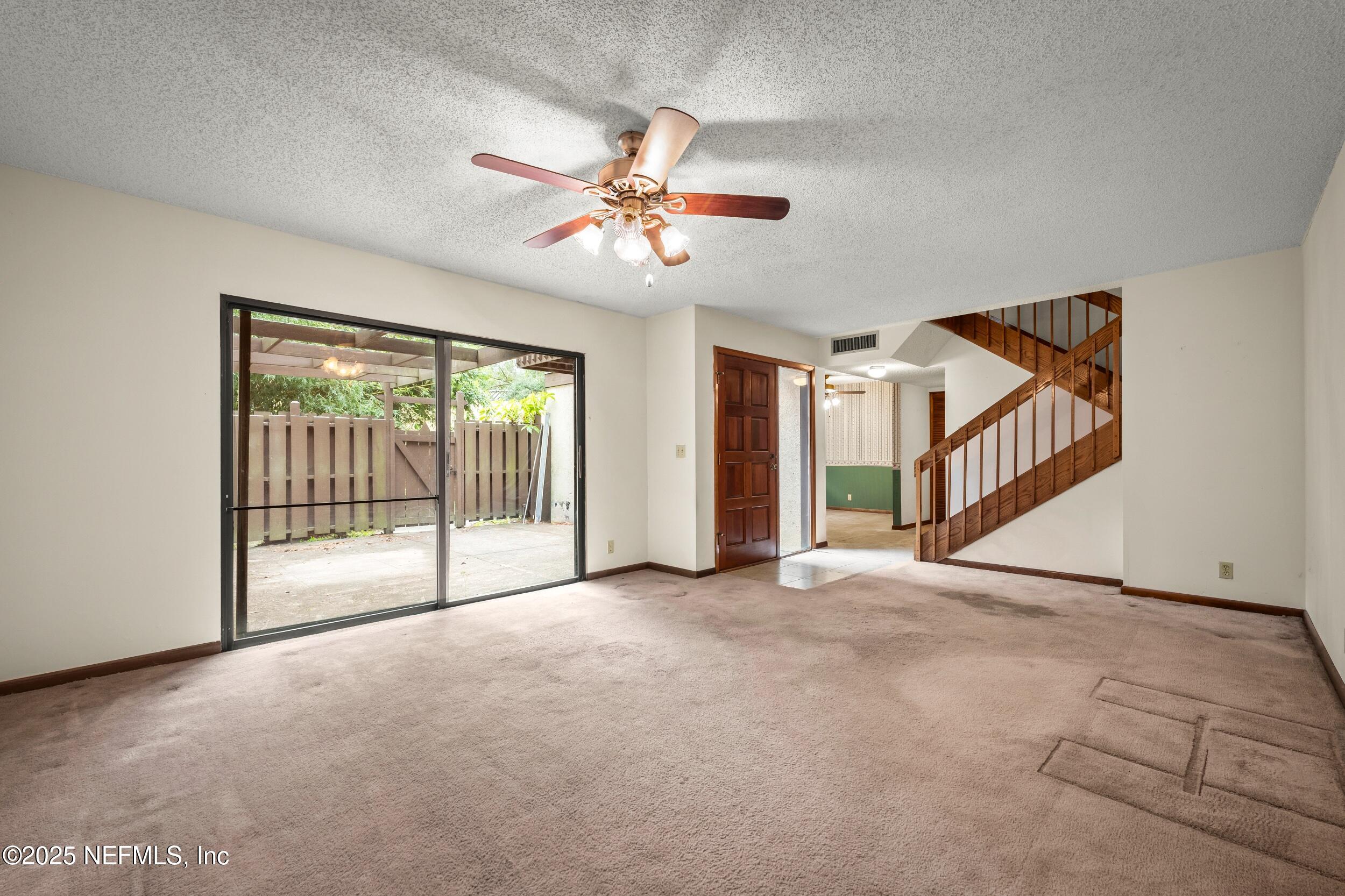 10349 Big Tree Terrace Jacksonville, FL 32257 - Photo 13 of 35 a view of empty room with ceiling fan