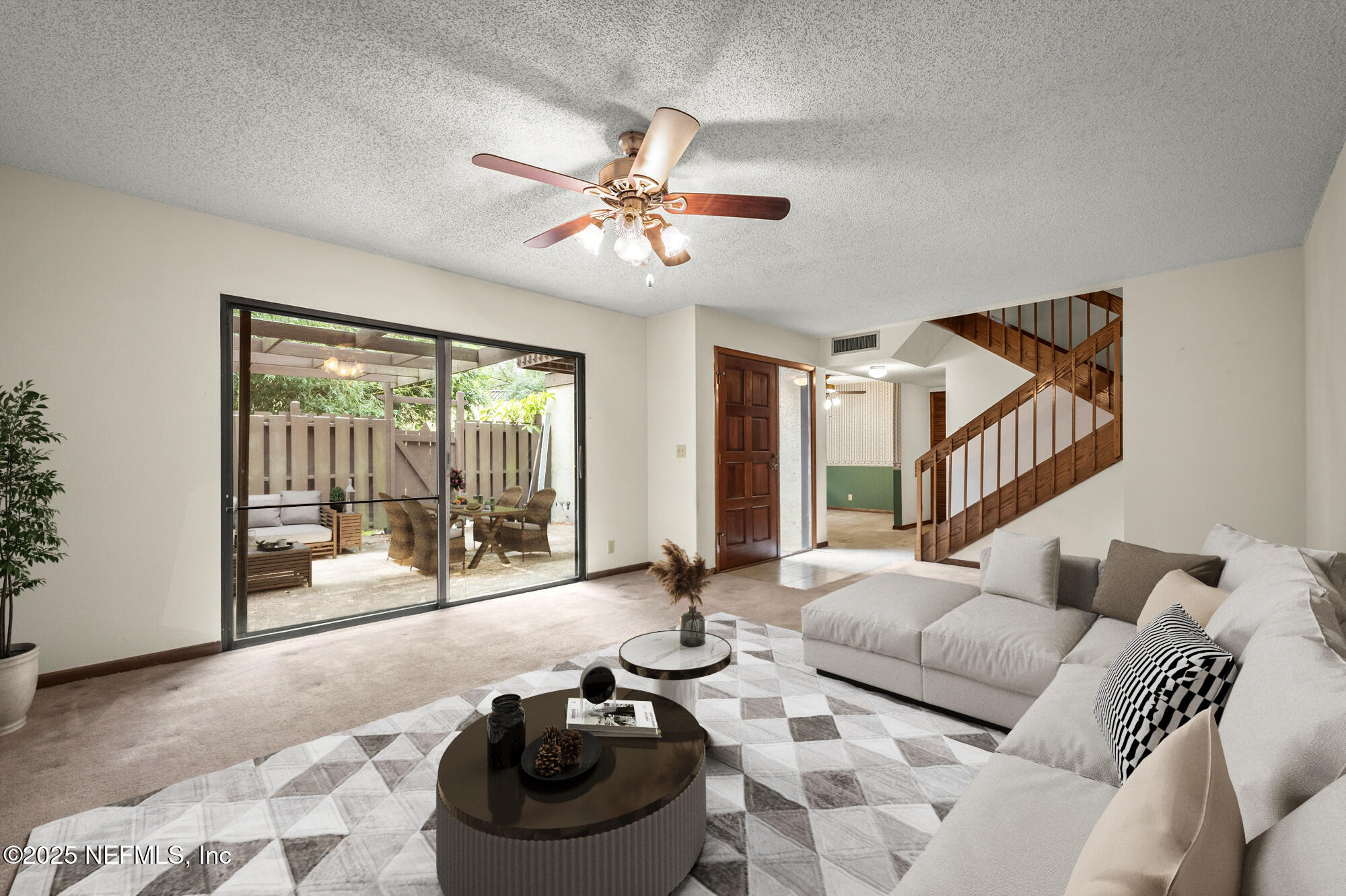 10349 Big Tree Terrace Jacksonville, FL 32257 - Photo 14 of 35 a living room with furniture and a large window