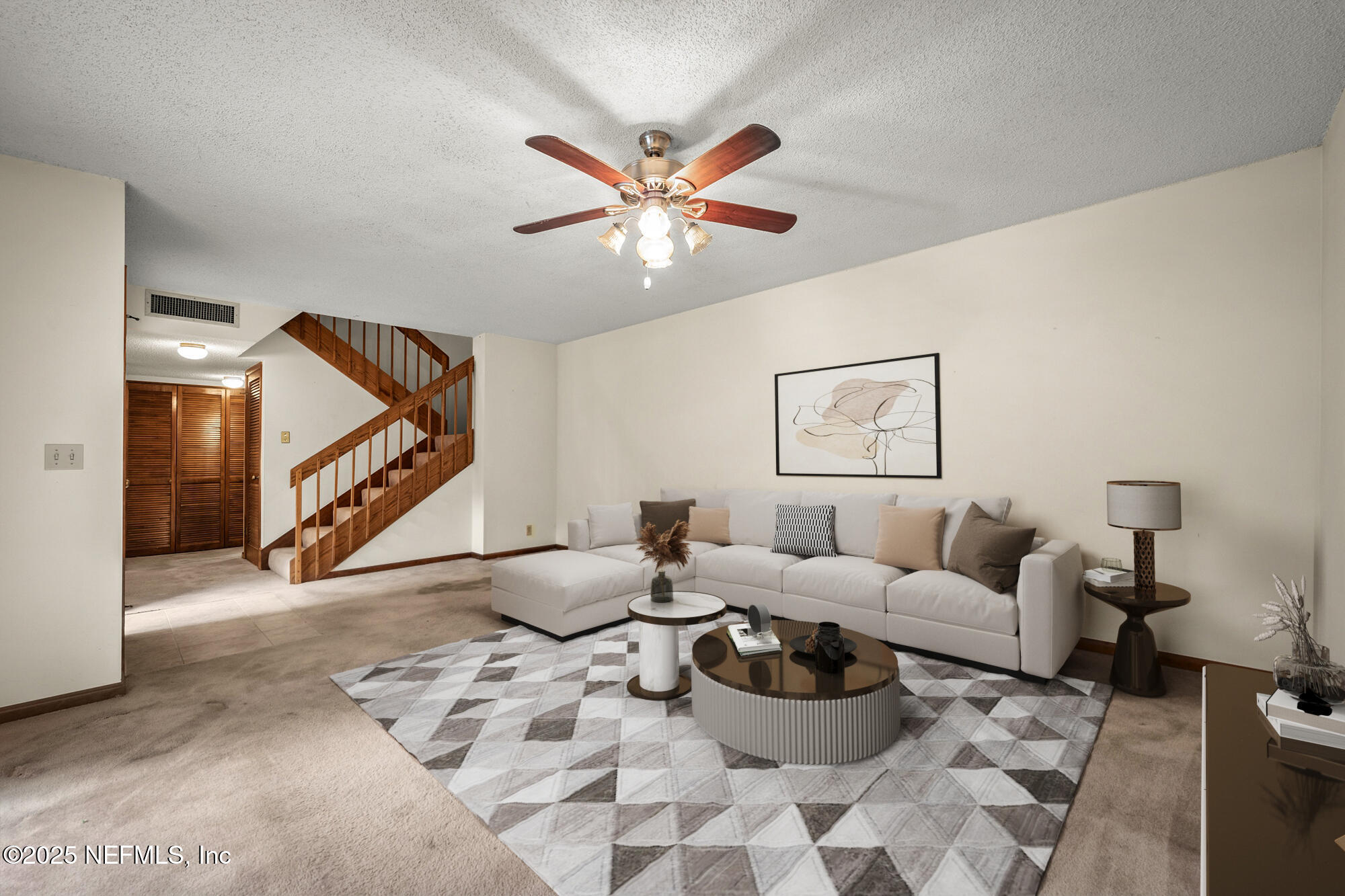10349 Big Tree Terrace Jacksonville, FL 32257 - Photo 16 of 35 a living room with furniture and a ceiling fan