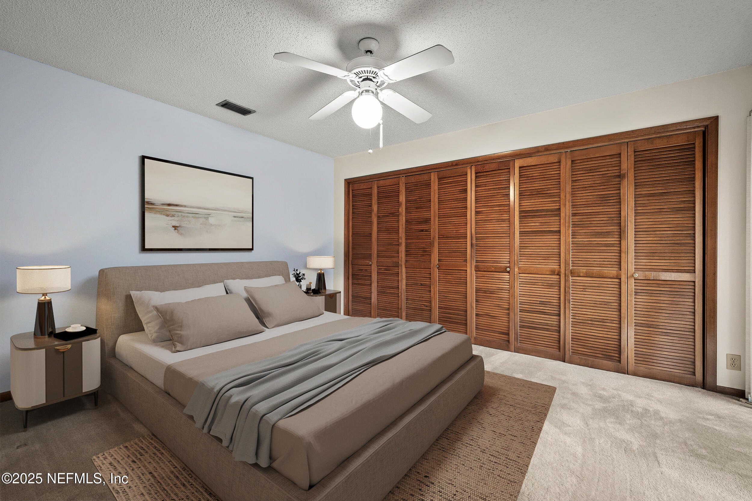 10349 Big Tree Terrace Jacksonville, FL 32257 - Photo 33 of 35 a bedroom with a large bed and a chandelier