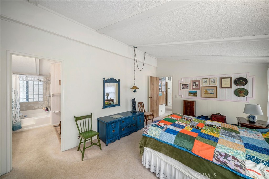 132 Quail Way Avila Beach, CA 93424 - Photo 18 of 38 a bedroom with furniture and a rug