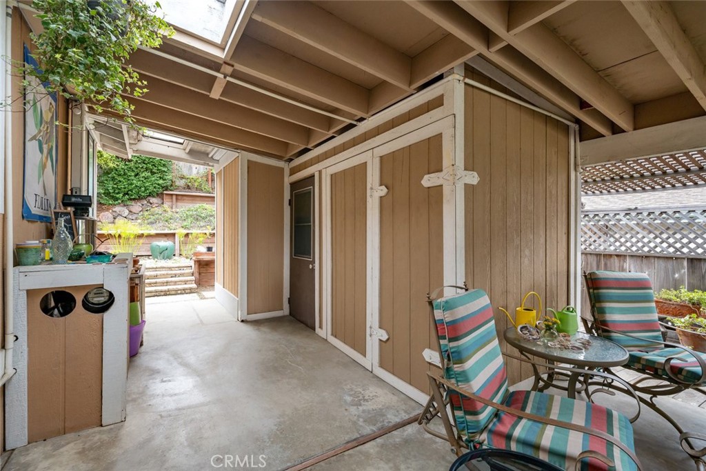 132 Quail Way Avila Beach, CA 93424 - Photo 30 of 38 a view of an entryway with wooden door