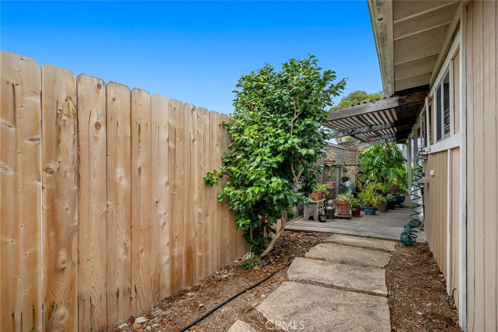 132 Quail Way Avila Beach, CA 93424 - Photo 32 of 38 a view of a house with backyard and garden
