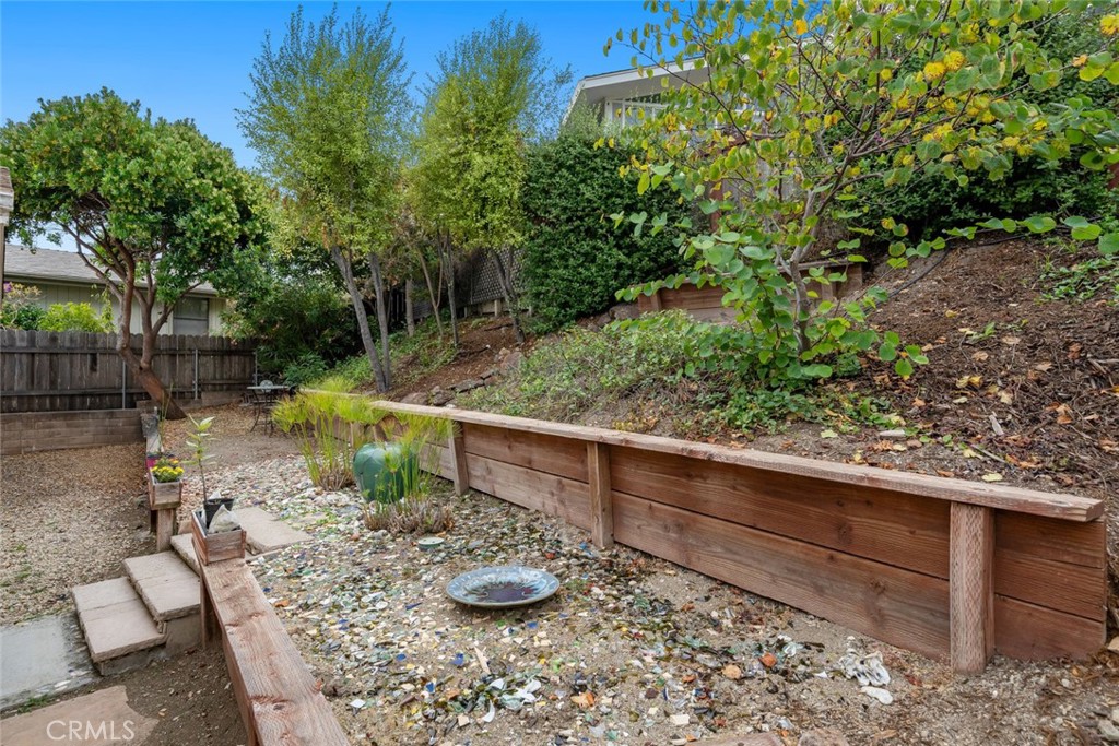 132 Quail Way Avila Beach, CA 93424 - Photo 33 of 38 a view of a backyard with sitting area