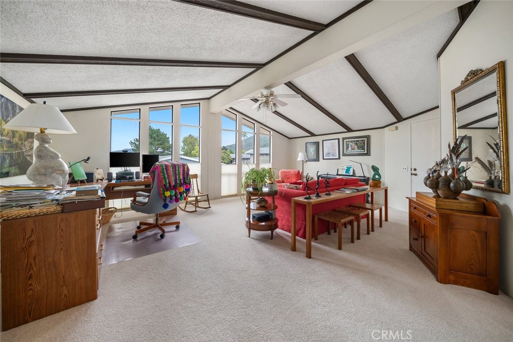 132 Quail Way Avila Beach, CA 93424 - Photo 7 of 38 a living room with lots of furniture and a chandelier
