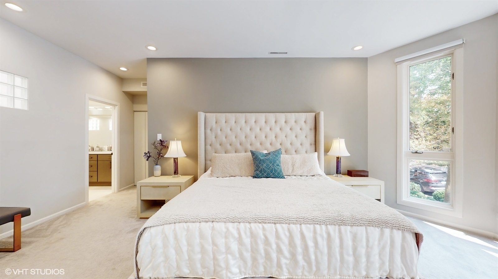 2216 North Wayne Avenue Chicago, IL 60614 - Photo 16 of 40 a bedroom with a large bed and a large window