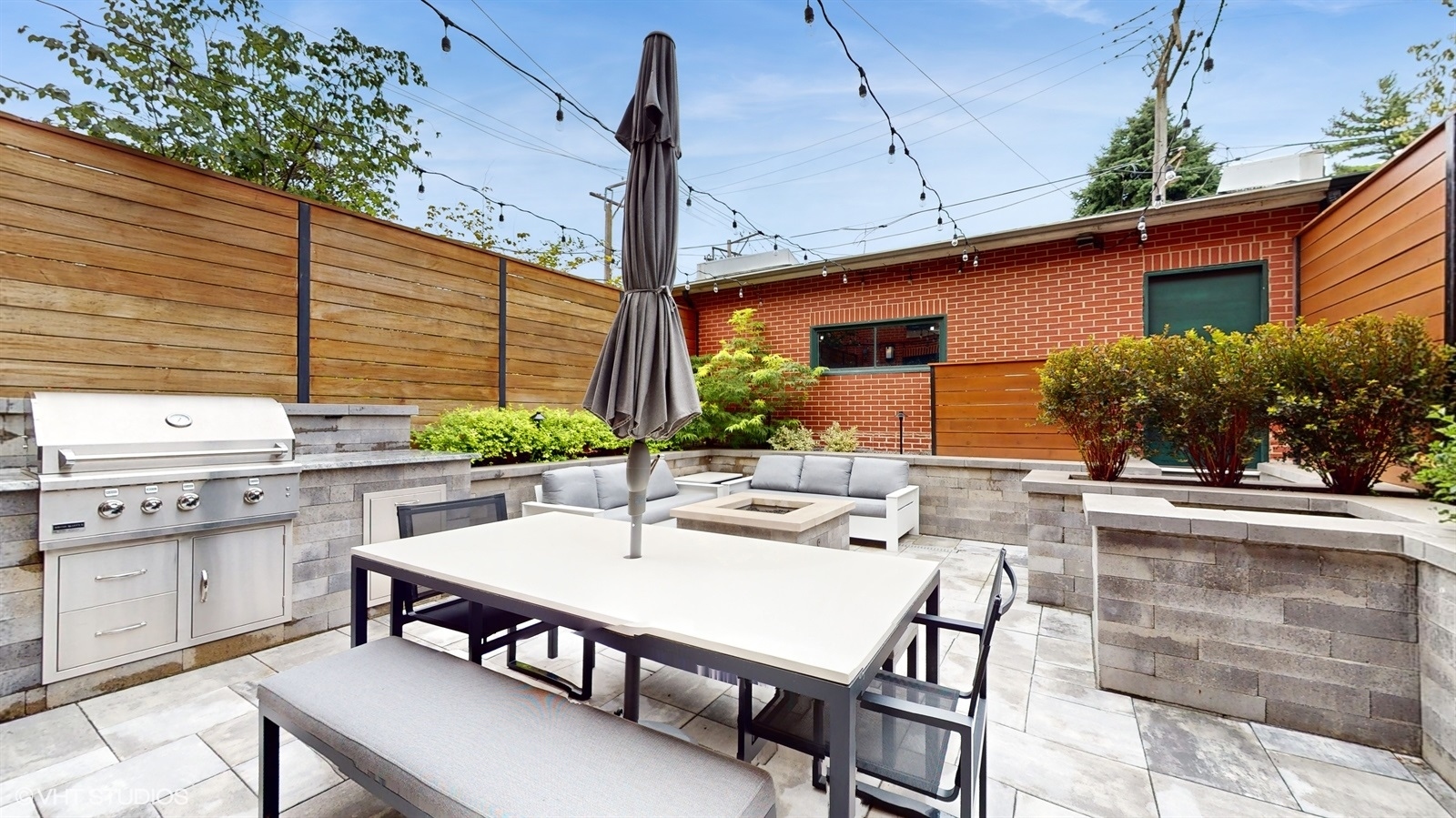 2216 North Wayne Avenue Chicago, IL 60614 - Photo 29 of 40 a outdoor dining space with furniture and outdoor kitchen