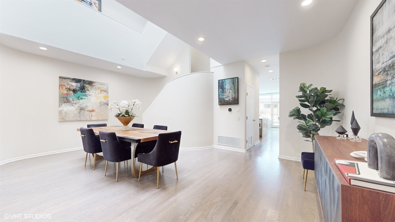 2216 North Wayne Avenue Chicago, IL 60614 - Photo 7 of 40 a view of a dining room with furniture and wooden floor